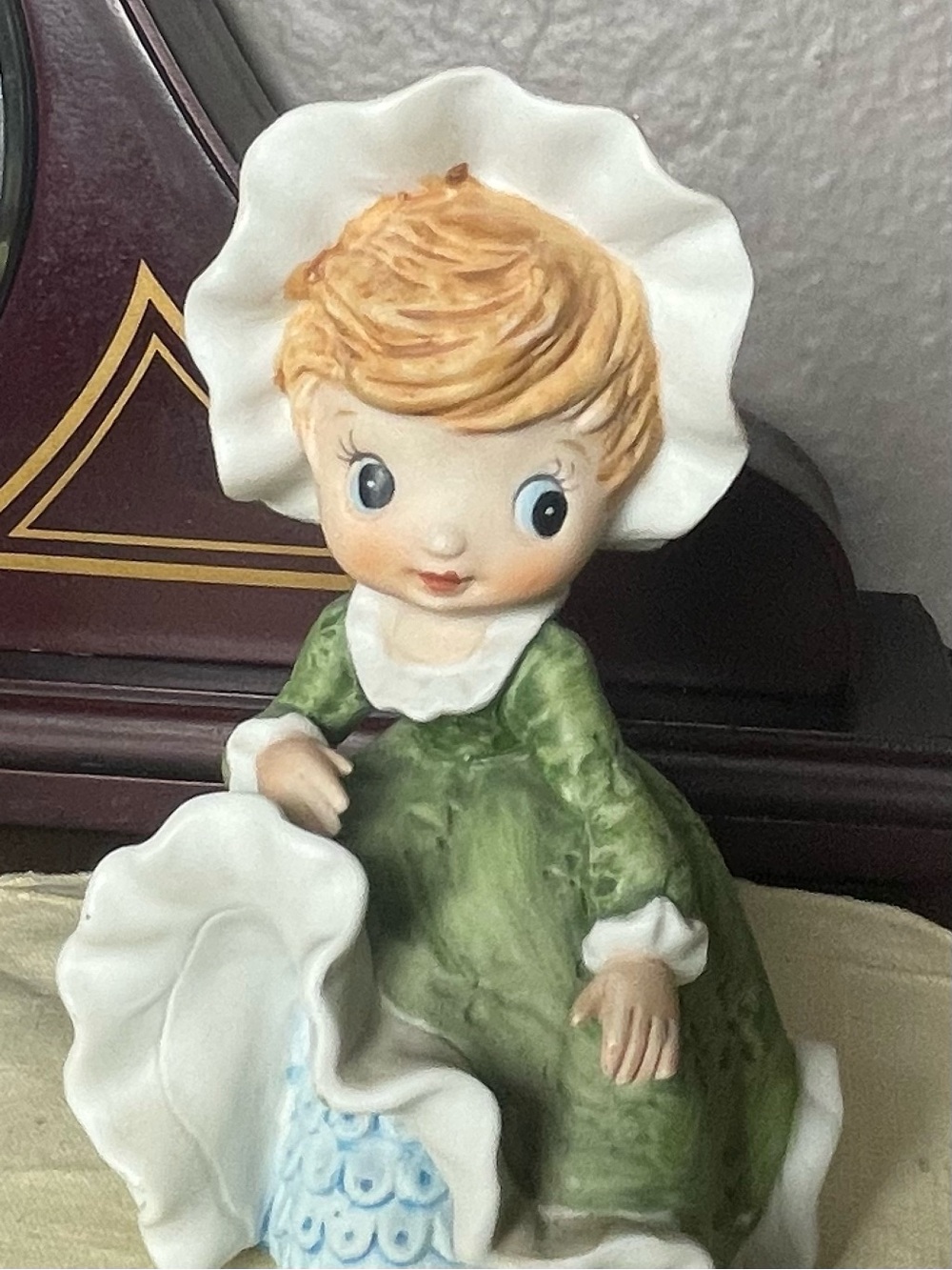 Vintage Porcelain Girl Figurine Green Dress and Bonnet Blonde Hair Decoration